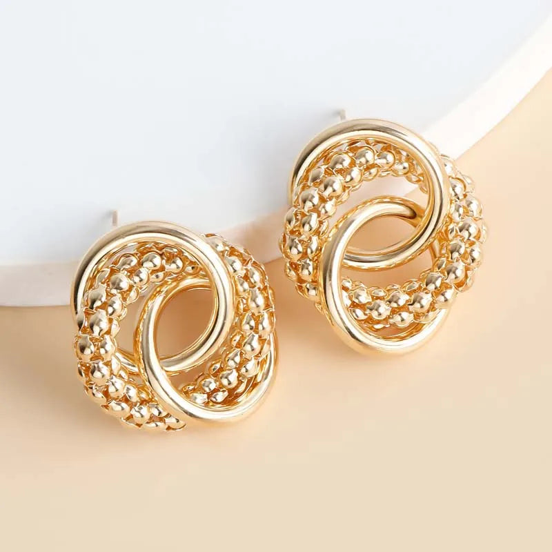 Twist Dangle Statement Earrings – Gold