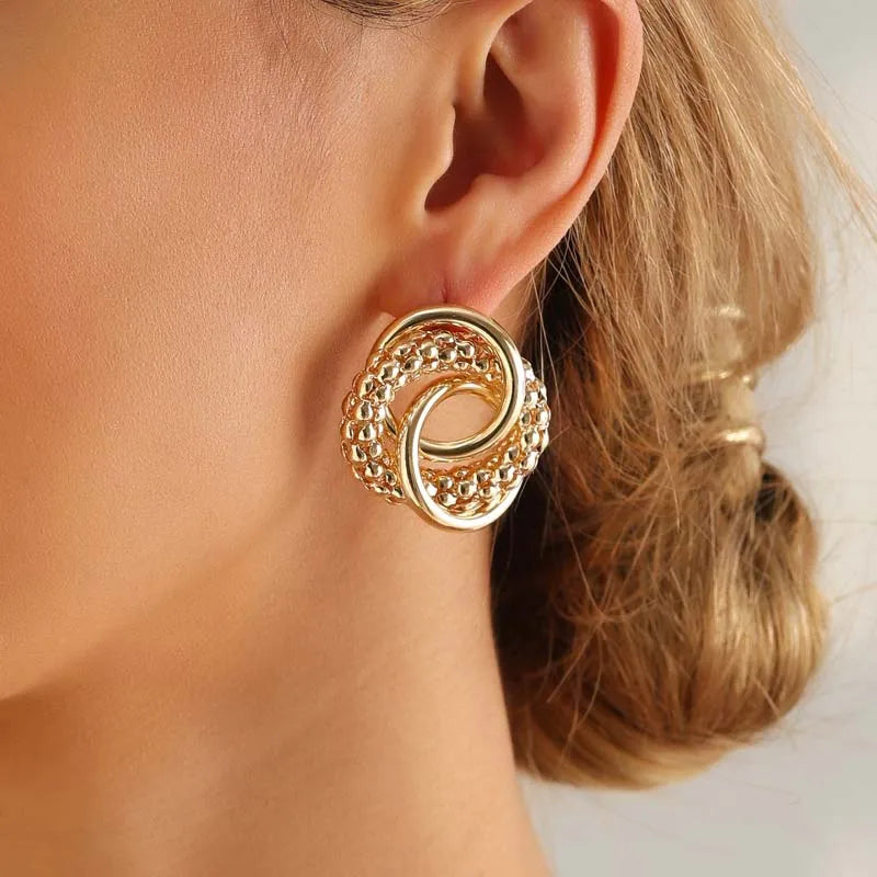 Twist Dangle Statement Earrings – Gold